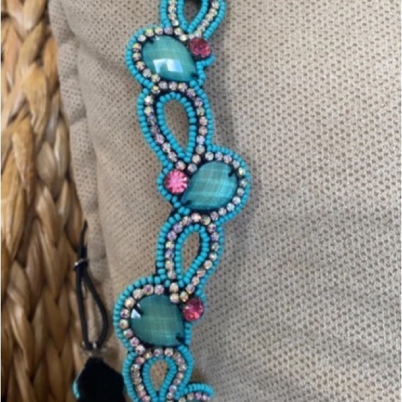Turquoise rhinestone elastic headband and choker.